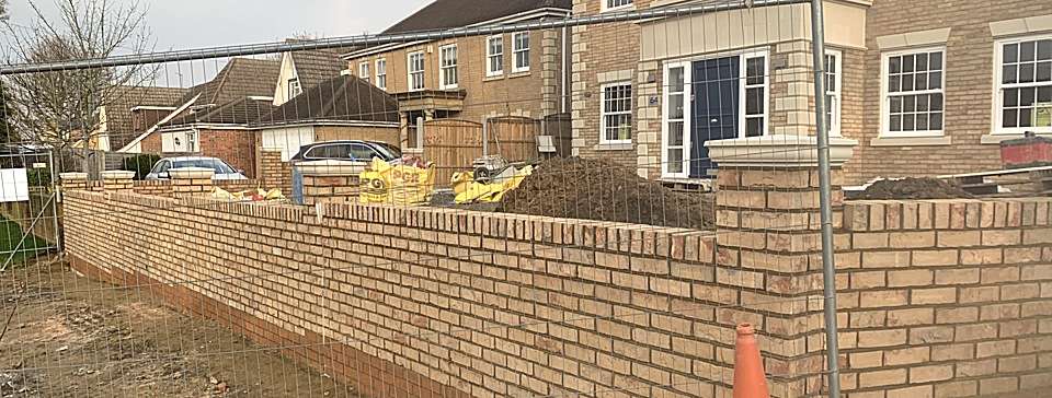 Brick garden wall construction